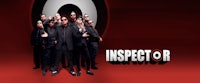 a group of men standing in front of a red background with the word inspector